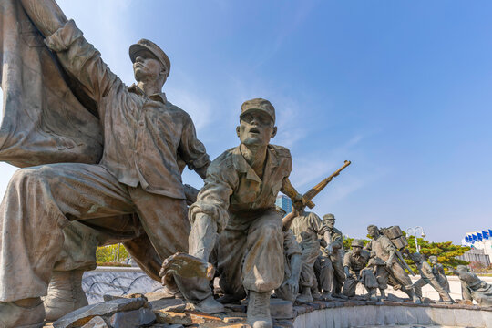 View of sculptures depicting soldiers at the War Memorial of Korea on a sunny day in Yongsan District, Seoul, South Korea