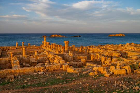 Exploring the ancient ruins of Apollonia in Eastern Libya during sunset near the Mediterranean Sea
