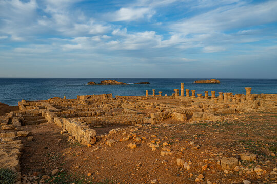 Ruins of the ancient Greek city Apollonia near the Mediterranean coast in Eastern Libya during sunset
