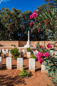 British World War 2 cemetery in Benghazi with white headstones and flowers