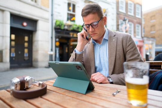 Taking a Business Call from a London Pub