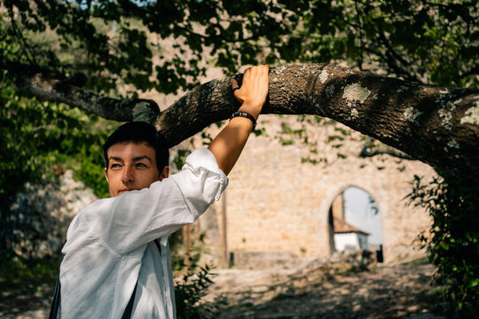 Person Enjoying Nature at Historic Site During Daytime