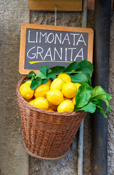 Limonata Granita sign with fresh lemons, Vernazza, Italy