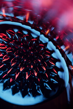 Abstract surreal magnetic fluid spikes with purple and violet light