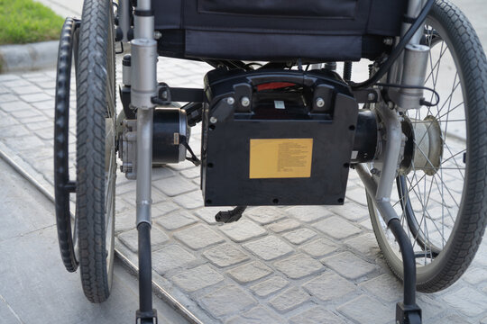 Battery power electric wheelchair increased mobility for disability or elderly patient.
