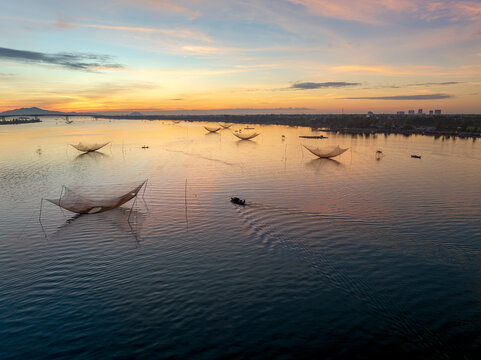 Aerial Lift Nets at Dawn