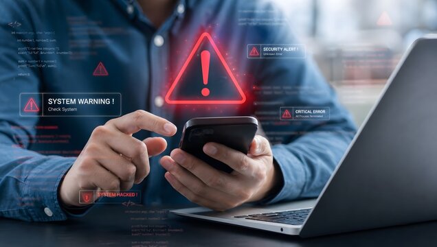 Cyber security specialist detecting system hack alert on mobile phone with virtual warning dashboard.