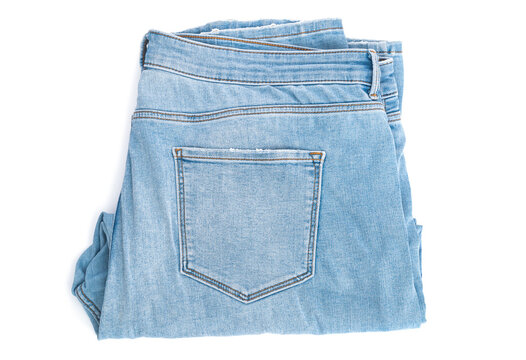 Blue jeans denim trousers close up isolated on white background