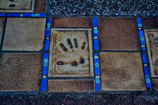 Cannes, France - February 12th 2018: Handprint of David Lynch engraved on the Cannes Walk of Fame near the Palais des Festivals, honoring the acclaimed filmmaker.