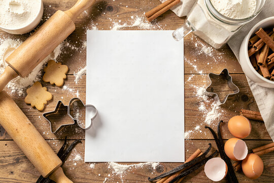 Rustic Baking Flat Lay with Flour, Cinnamon, and Vanilla Beans on Wooden Table