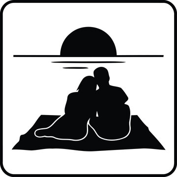 Romantic Couple Silhouette Watching Sunset on Beach Blanket