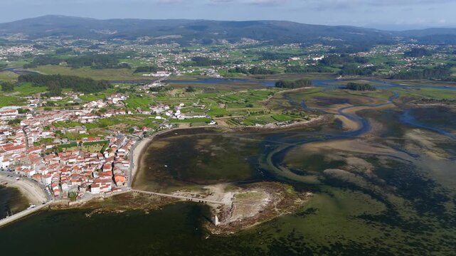Aerial View of Cambados Coastline, the San Sadurni&ntilde;o Tower Ruins, and the R&iacute;a de Arousa Estuary, Galicia, Spain