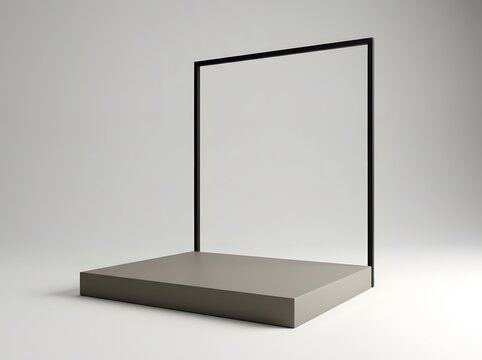 Minimalist black frame standing upright on a rectangular light gray pedestal against a plain white background clean modern design for display or presentation purposes