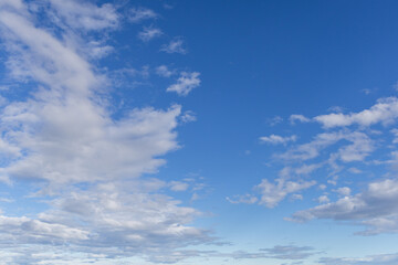 Naklejka premium Blue Sky With Scattered Clouds Over the Strait of Georgia, British Columbia, Canada