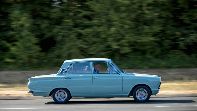 Milton Keynes,UK - July 16th 2025:   1996 Ford Cortina classic car driving on a British road.