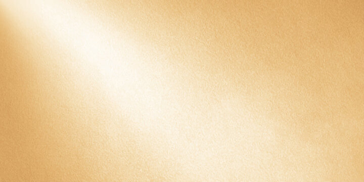 Abstract warm beige and golden gradient textured background with soft grunge paper surface and elegant vintage backdrop for premium graphic design