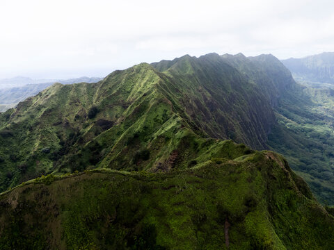 Aerial view of the green Kuliouou Ridge Trail winding along the mountains, Oahu