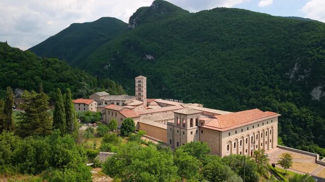 Santa Scolastica Monastery Subiaco Italy Aerial Drone Sunset View, Ancient Benedictine Abbey in Green Mountains, Historical Castle Complex Architecture in Lazio Travel Video 4K UHD