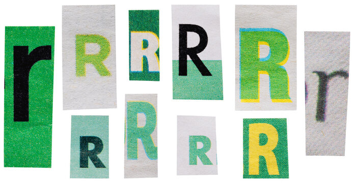Set of green ransom letters R cut out from vintage newspapers and magazines isolated for collage
