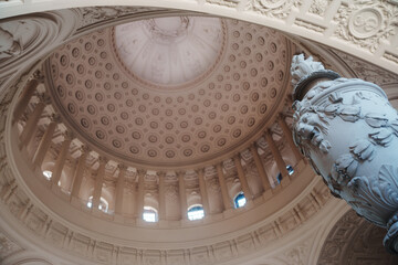 Elegant architectural details inside San Francisco City Hall, featuring ornate Beaux-Arts design, decorative columns, marble surfaces, intricate craftsmanship, and historic civic architecture. © Glebstock