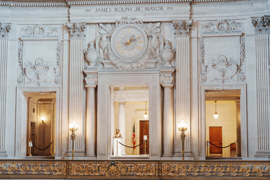 Elegant architectural details inside San Francisco City Hall, featuring ornate Beaux-Arts design, decorative columns, marble surfaces, intricate craftsmanship, and historic civic architecture.