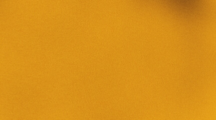 Naklejka premium Golden yellow fine grain texture surface, subtle noise pattern across smooth luminous backdrop with warm glowing light effect