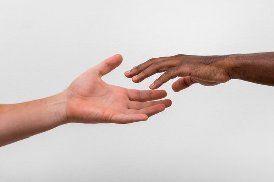man and woman shaking hands