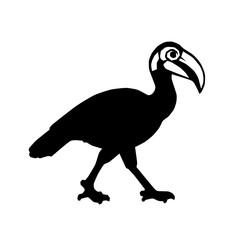 A ground hornbill walking on the ground, large beak, black plumage, monochrome throat patch. © robin