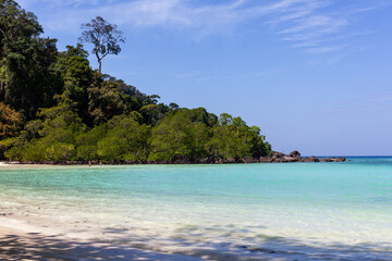 Obraz premium Mai Ngam Beach, Koh Surin, Thailand. Tropical island with clear sea. Sandy coastline and lush greenery.