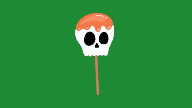 Spooky skull lollipop with orange caramel glaze on a green screen chroma key background cartoon animation asset