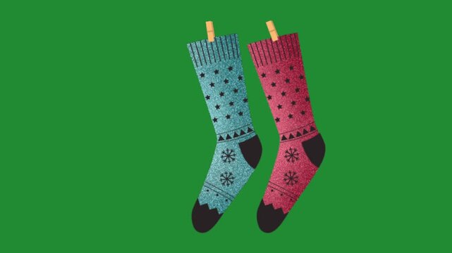 Hanging Christmas socks pair vector graphic animation on a green screen background for holiday celebration