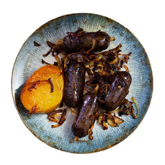 Fototapeta premium Traditional Russian or Belarusian dish is fried black pudding. Blood sausages is flavored with gravy of fried onions in sunflower oil. Isolated over white background