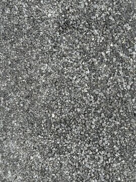 Close up of crushed dark grey gravel surface