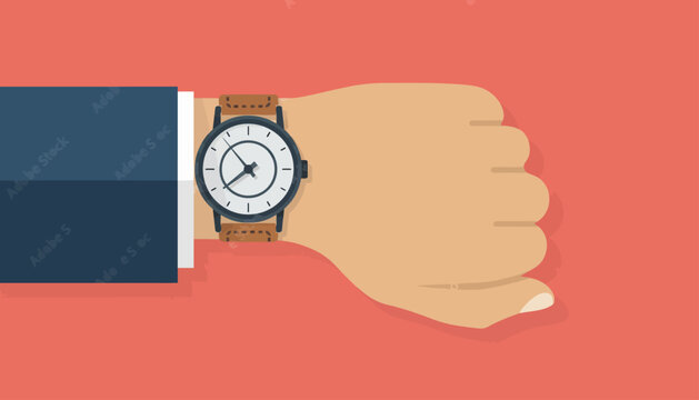 Wristwatch worn on a human arm indicates the importance of time management in a professional business setting.