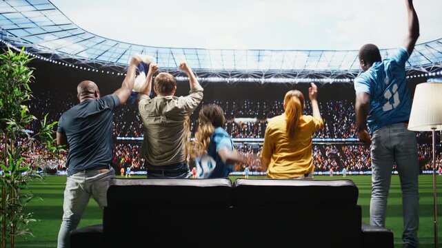 Soccer supporters feel pleased by a positive live game result on immersive TV as ecstatic football fans enjoy a goal and stadium experience at home.