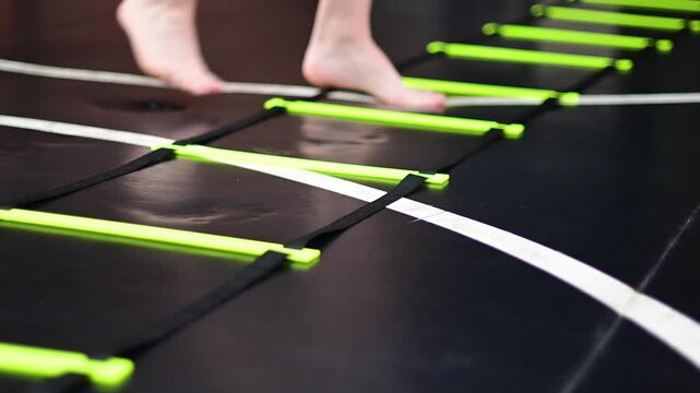 mobility ladder close up on feet, man working on his movement