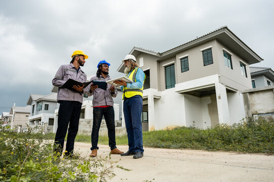 Engineers discussed preparation for installing small solar panels in residential village construction areas for sustainable energy projects and improving the landscape within the village project.