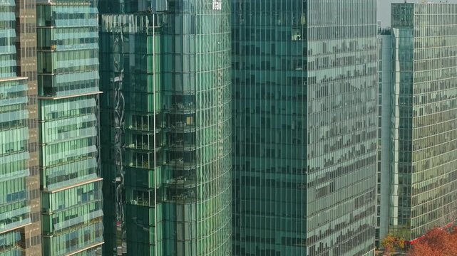 Telephoto aerial view of modern glass buildings, financial office buildings in Nueva Las Condes, Santiago, Chile