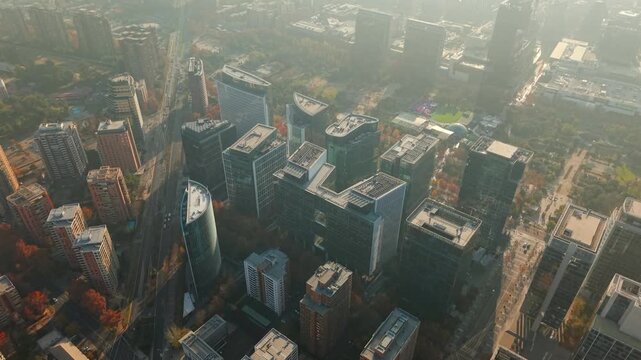 Aerial view establishing modern buildings in Nueva Las Condes, the financial district of Santiago, Chile, with a light mist