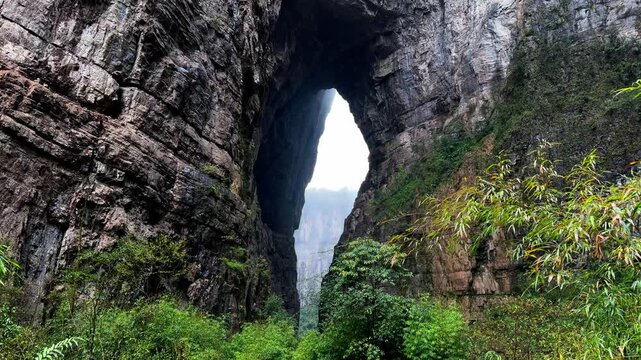 Natural Stone Bridge Cluster At Three Natural Bridges In The Wulong Karst Geological Park In Chongqing, China. Tilt-up Shot