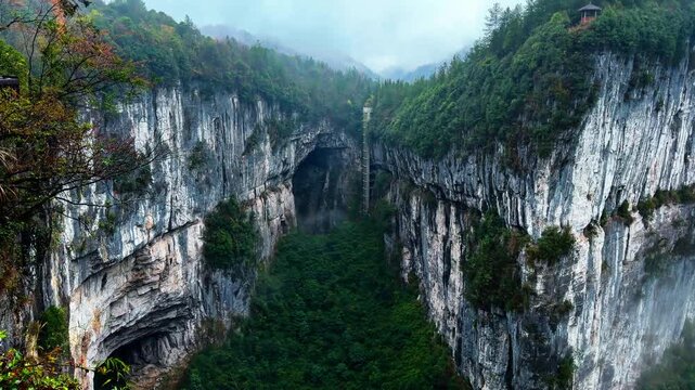 Steep Canyons With Tiankeng Cliff Elevator In The Wulong Karst National Geology Park In Chongqing, China. Tilt-up Shot
