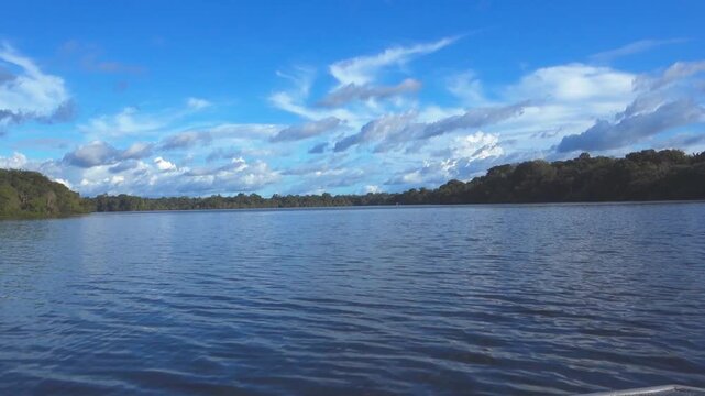 Expansive Juma river, Amazon jungle boat ride. wide shot