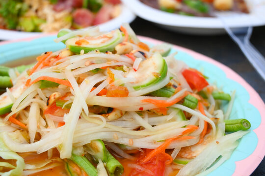 Thai green papaya salad serve in bowl, Thai cusine and healthy eating