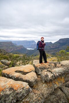 Tourist at Lowveld Viewpoint, view of the Blyde RIver gorge, canyon landscape, Blyde River Canyon, Panorama Route, Mpumalanga, South Africa