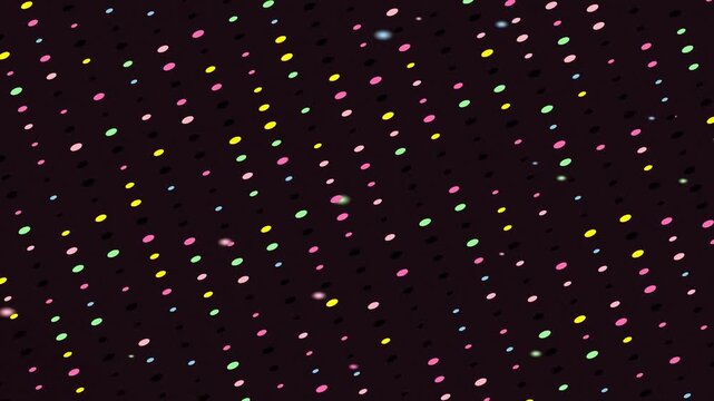 Colorful speckles scattered on black background