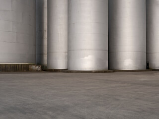 Car background, automotive backplate, industrial storage silos for oil, fuel, grain. © Chris