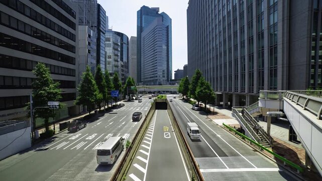 A timelapse of traffic jam at the urban city street in Tokyo wide shot tilt