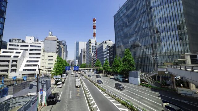 A timelapse of traffic jam at the urban city street in Tokyo wide shot tilt