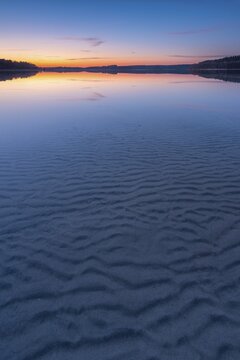 Lake F&uuml;rstensee, clear water with wave structure in the sand, sunset, M&uuml;ritz National Park, F&uuml;rstensee, Mecklenburg-Western Pomerania, Germany