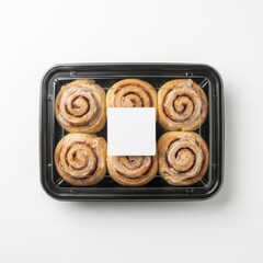Fototapeta premium Cinnamon Roll in Clear Plastic Clamshell Container with Blank White Label